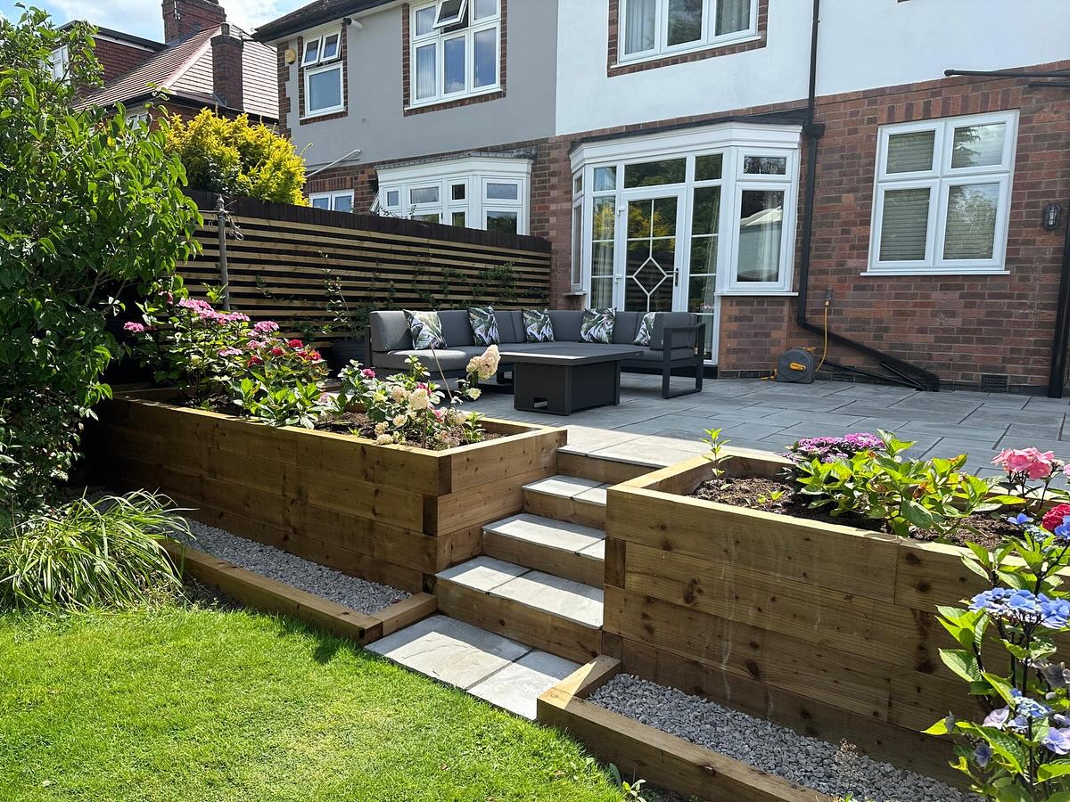 Timber raised planters with porcelain steps and hydrangea planting, Birstall